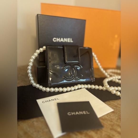 CHANEL Handbags - CHANEL FULL INCLUSION Camellia Patent Leather Bifold Pearl Crossbody Wallet